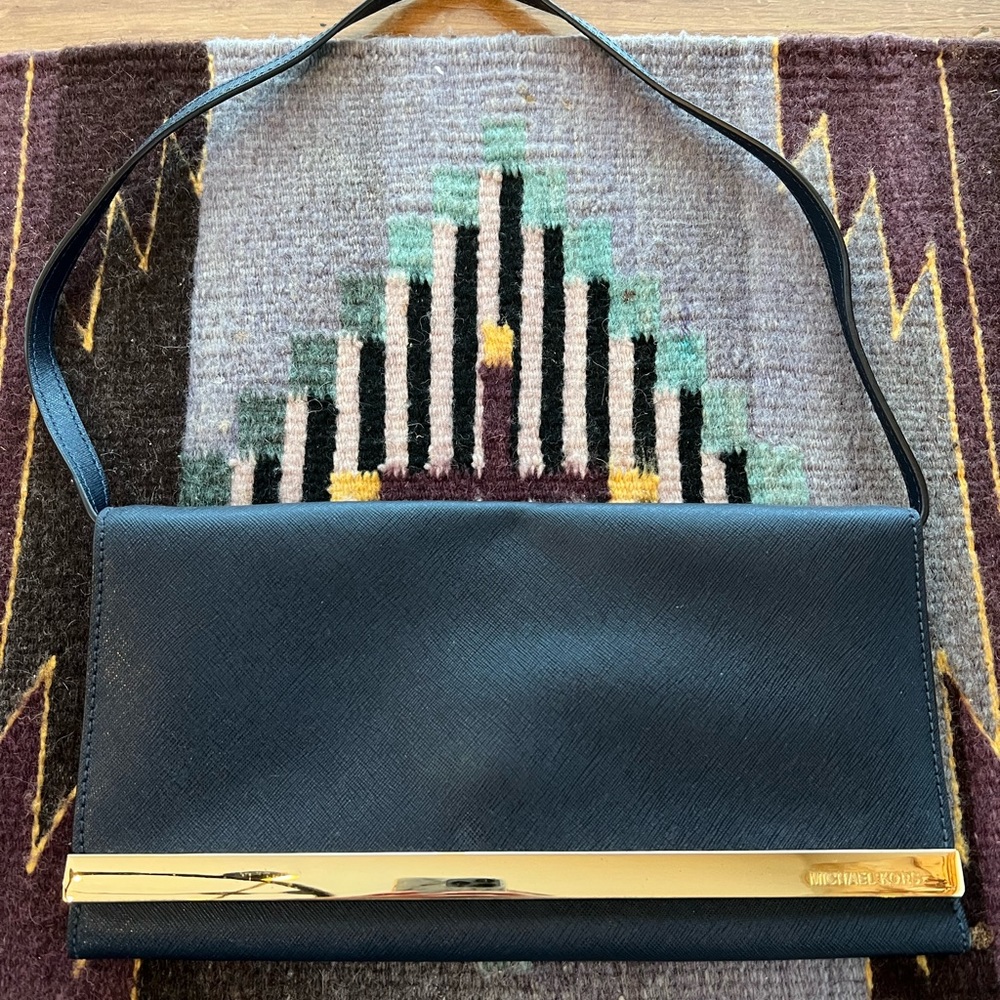 Michael Kors navy blue clutch/shoulder bag with gold detailing